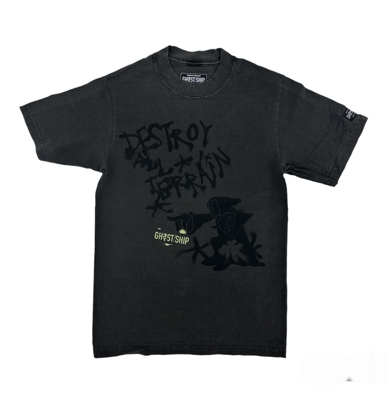 a faded black t-shirt with the words "destroy all terrain" done in the style of graffiti with a yellow GHOST SHIP graphic